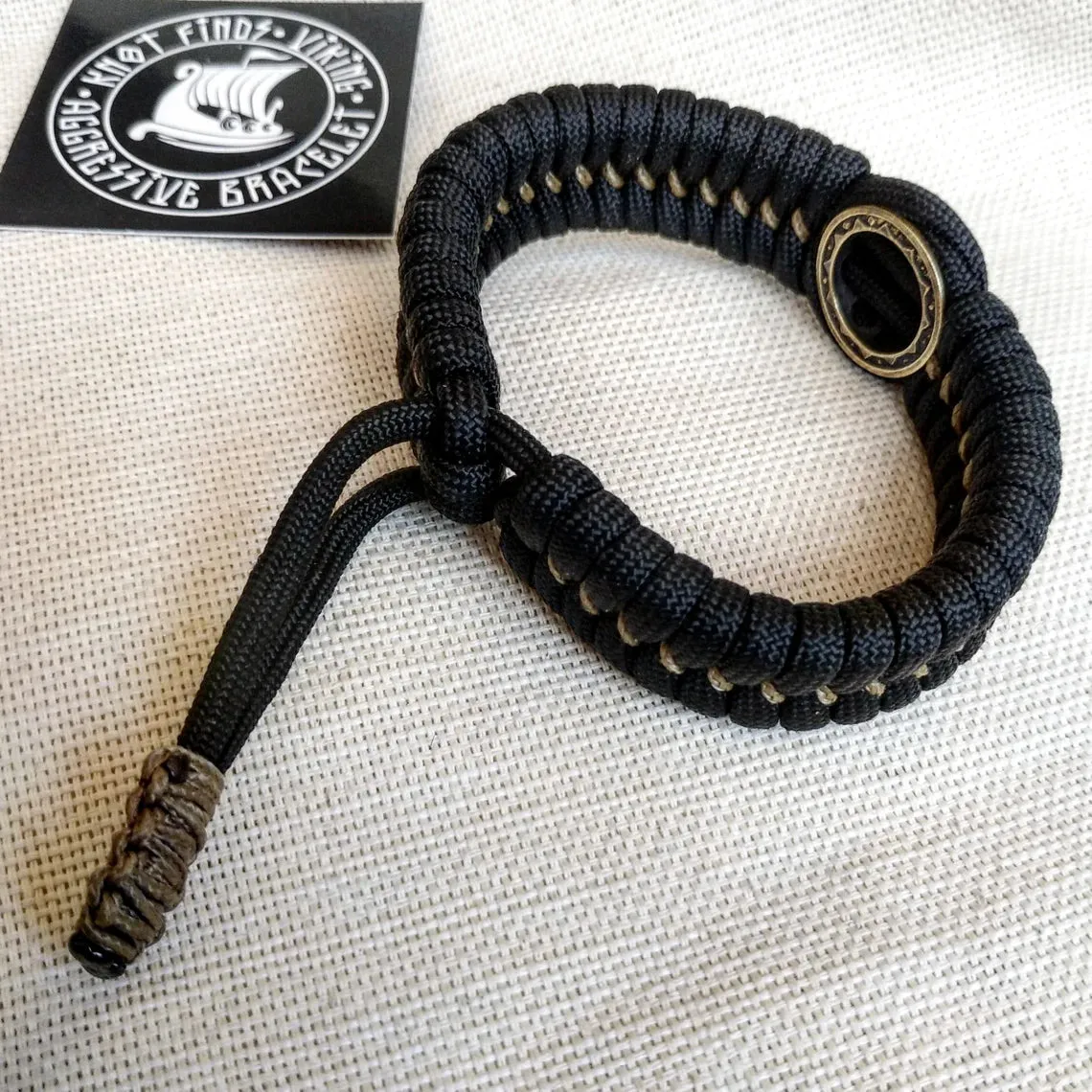 Nordic paracord bangle "VALKNUT". The original brutal bracelet made of Celtic knots and beads. Viking style.