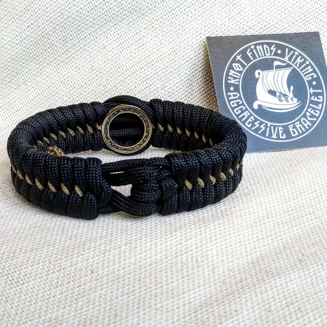Nordic paracord bangle "VALKNUT". The original brutal bracelet made of Celtic knots and beads. Viking style.